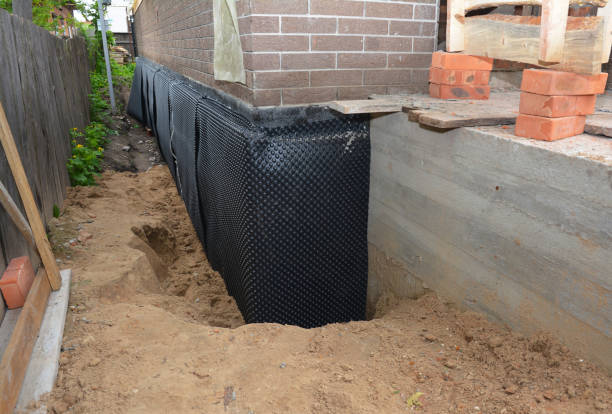 Happy homeowners after waterproofing job in Port Jefferson Station